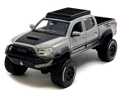 2023 Toyota Tacoma TRD PRO Off Road Pickup Truck Cement Gray with Black Hood and Roofrack "Maisto Design" Series 1/27 Diecast Model Car by Maisto