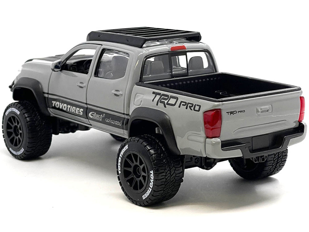 2023 Toyota Tacoma TRD PRO Off Road Pickup Truck Cement Gray with Black Hood and Roofrack "Maisto Design" Series 1/27 Diecast Model Car by Maisto