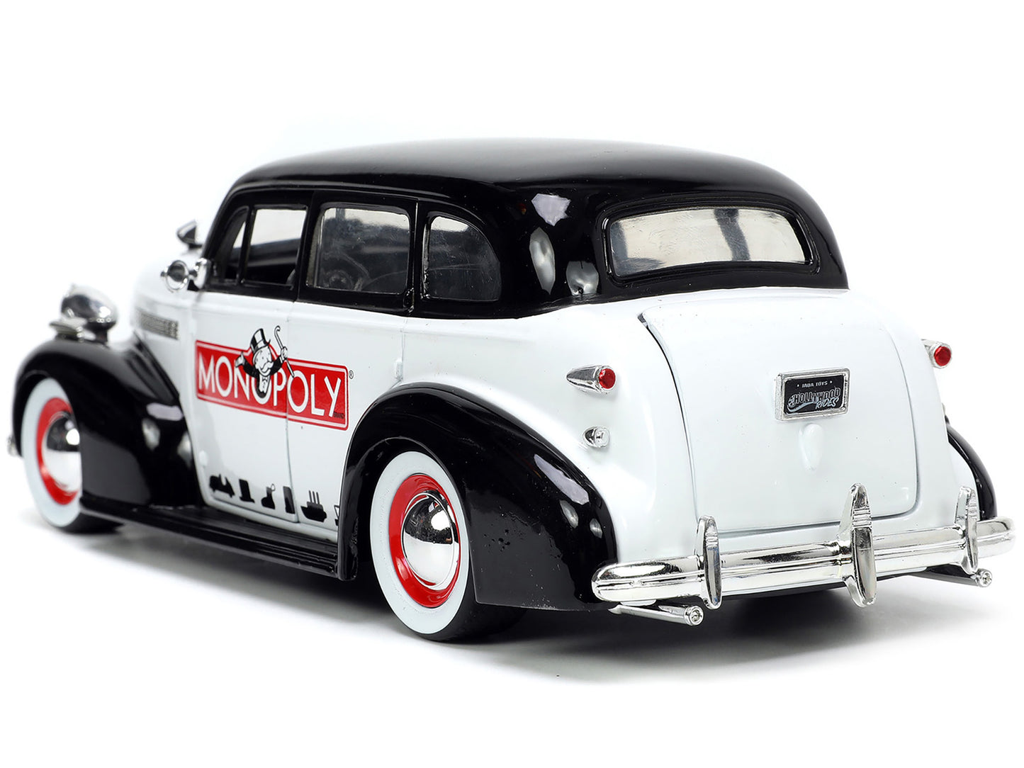 1939 Chevrolet Master Deluxe Black and White "Monopoly" and Mr. Monopoly Diecast Figure "Hollywood Rides" Series 1/24 Diecast Model Car by Jada