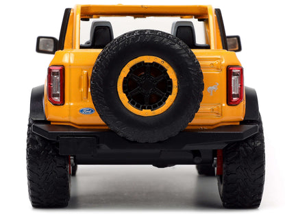 2021 Ford Bronco Orange Metallic with Extra Wheels "Just Trucks" Series 1/24 Diecast Model Car by Jada