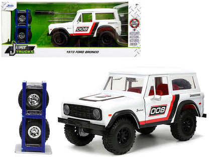 1973 Ford Bronco #008 White with Red and Black Stripes and Red Interior with Extra Wheels "Just Trucks" Series 1/24 Diecast Model Car by Jada