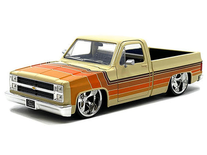 1985 Chevrolet C-10 Pickup Truck Beige with Stripes and Cartelli Wheels "Just Trucks" Series 1/24 Diecast Model Car by Jada