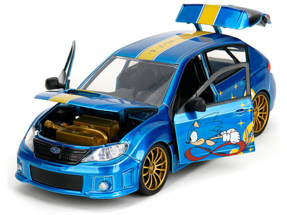 2012 Subaru Impreza WRX STI Blue Metallic with Graphics and Sonic The Hedgehog Diecast Figure "Sonic The Hedgehog" "Hollywood Rides" Series 1/24 Diecast Model Car by Jada