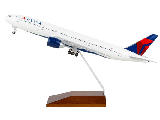 Boeing 777-200 Commercial Aircraft with Landing Gear and Wood Stand "Delta Air Lines" (N709DN) White with Blue and Red Tail (Snap-Fit) 1/200 Plastic Model by Skymarks