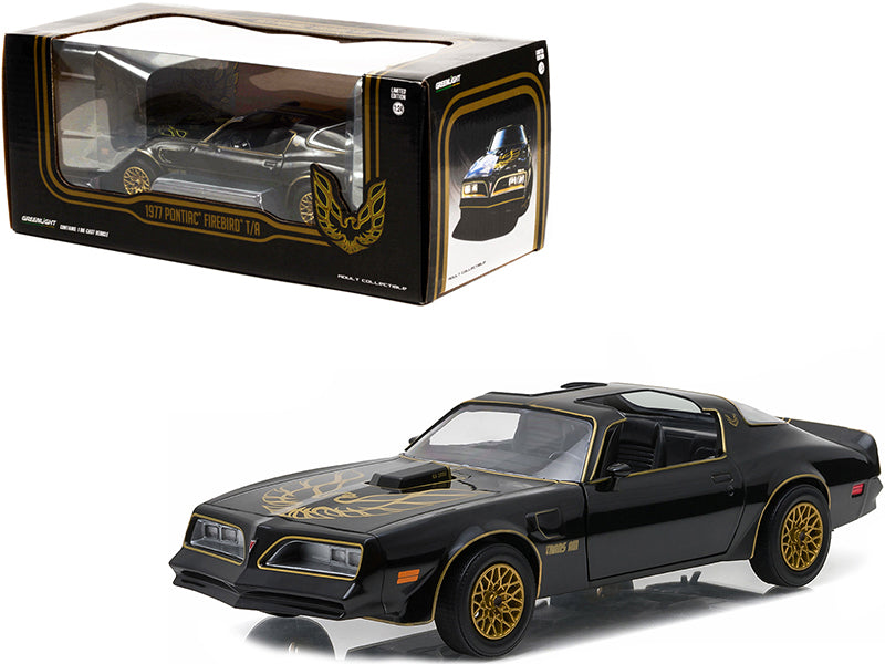 1977 Pontiac Firebird Trans Am T/A Starlite Black with Golden Eagle Hood and Stripes 1/24 Diecast Model Car by Greenlight