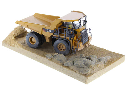 CAT Caterpillar 770 Off-Highway Truck Yellow (Weathered) with Operator "Weathered" Series 1/50 Diecast Model by Diecast Masters