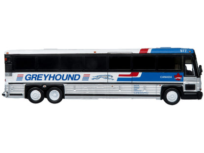 2001 MCI D4000 Coach Bus "Greyhound Canada" Blue and White with Red Stripes "Vintage Bus & Motorcoach Collection" Limited Edition to 504 pieces Worldwide 1/87 (HO) Diecast Model by Iconic Replicas