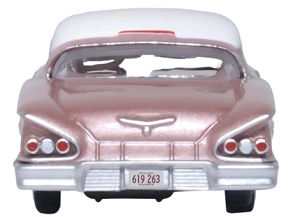 1958 Chevrolet Impala Sport Cay Coral Pink Metallic with White Top 1/87 (HO) Scale Diecast Model Car by Oxford Diecast