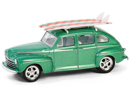 1946 Ford Fordor Super Deluxe Green Metallic with White Interior and Roof Rack with Surfboards "The Hobby Shop" Series 16 1/64 Diecast Model Car by Greenlight