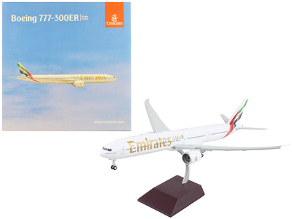 Boeing 777-300ER Commercial Aircraft with Flaps Down "Emirates Airlines - 2023 Livery" White with Striped Tail "Gemini 200" Series 1/200 Diecast Model Airplane by GeminiJets