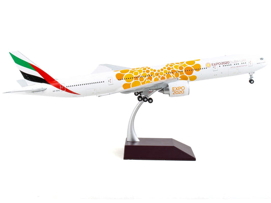 Boeing 777-300ER Commercial Aircraft "Emirates Airlines - Dubai Expo 2020" White with Orange Graphics "Gemini 200" Series 1/200 Diecast Model Airplane by GeminiJets