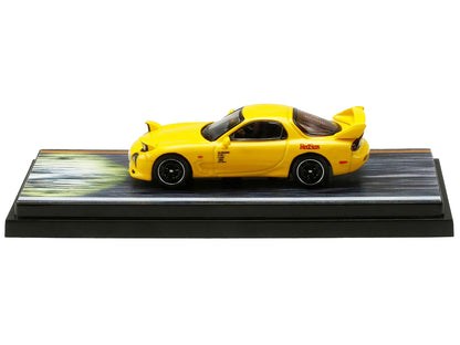 Mazda RX-7 (FD3S) RHD (Right Hand Drive) Yellow "RedSuns" with Keisuke Takahashi Driver Figure "Initial D" (1995-2013) Manga 1/64 Diecast Model Car by Hobby Japan