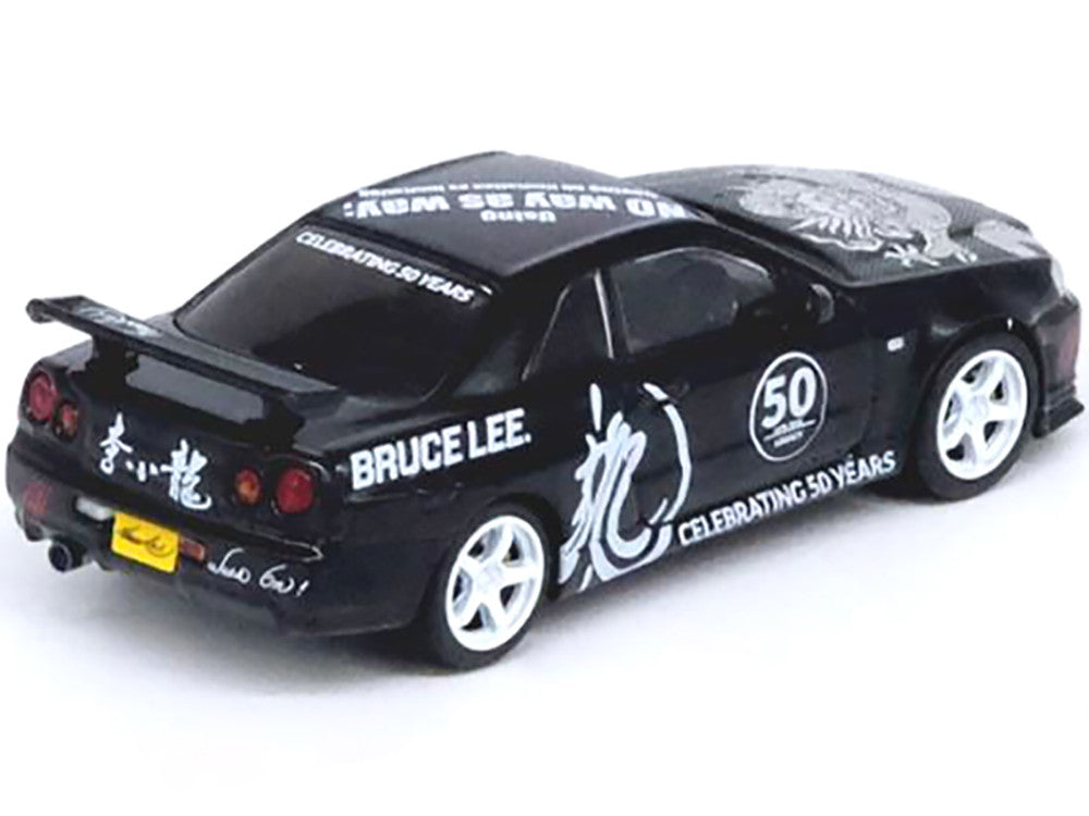 Nissan Skyline GT-R (R34) RHD (Right Hand Drive) Black "Bruce Lee Legacy 50 Year Anniversary" 1/64 Diecast Model Car by Inno Models