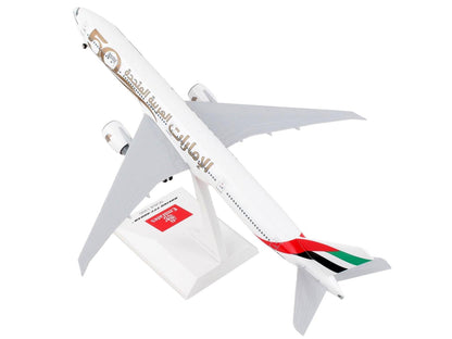 Boeing 777-300ER Commercial Aircraft with Landing Gear "Emirates Airlines - 50th Anniversary" (A6-EPO) White with Tail Graphics (Snap-Fit) 1/200 Plastic Model by Skymarks