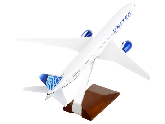 Boeing 787-10 Dreamliner Commercial Aircraft "United Airlines" (N12010) White with Blue Tail and Wood Stand (Snap-Fit) 1/200 Plastic Model by Skymarks