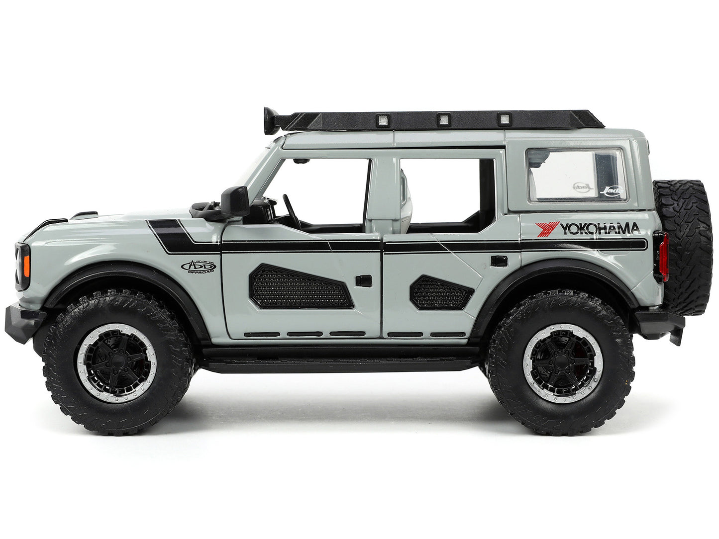 2021 Ford Bronco Gray with Black Stripes with Roof Rack "Own the Night" "Just Trucks" Series 1/24 Diecast Model Car by Jada