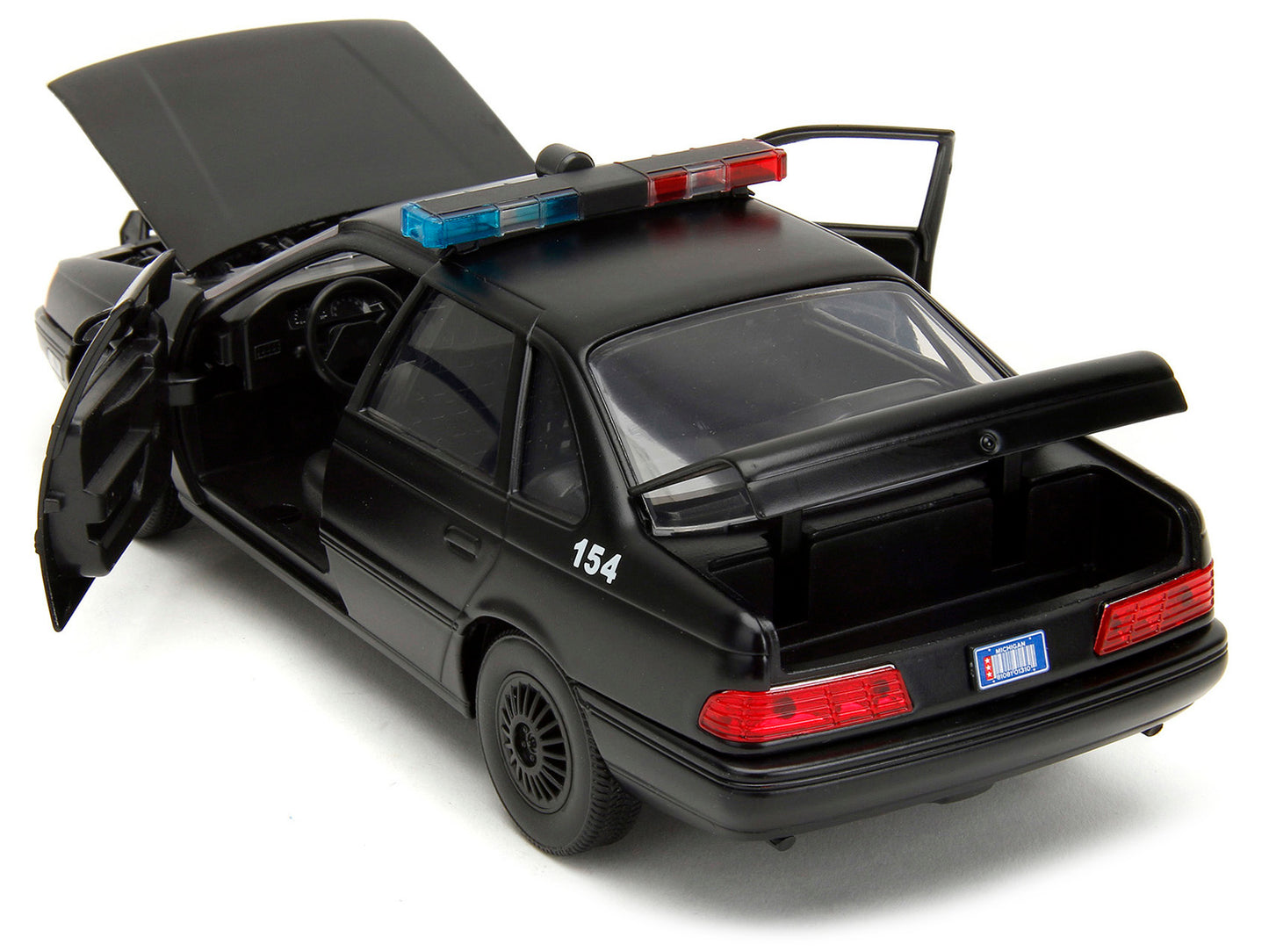 Ford Taurus OCP Matt Black "Detroit Police" and Robocop Diecast Figure 35th Anniversary "Robocop" (1987) Movie "Hollywood Rides" Series 1/24 Diecast Model Car by Jada