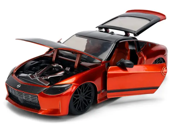 2023 Nissan Z Orange Metallic with Carbon Hood and Black Top "JDM Tuners" Series 1/24 Diecast Model Car by Jada #2