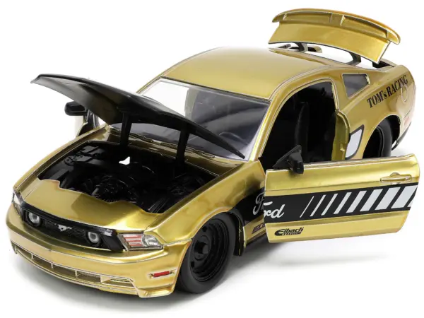 2010 Ford Mustang GT Gold Metallic with Black Graphics and Hood "Tom's Racing" "Bigtime Muscle" Series 1/24 Diecast Model Car by Jada #2