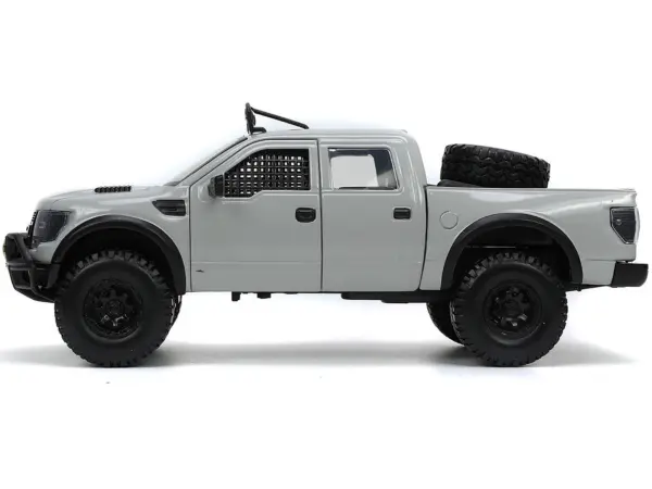 2011 Ford F-150 SVT Raptor Pickup Truck Light Gray with Extra Wheels "Just Trucks" Series 1/24 Diecast Model Car by Jada #4