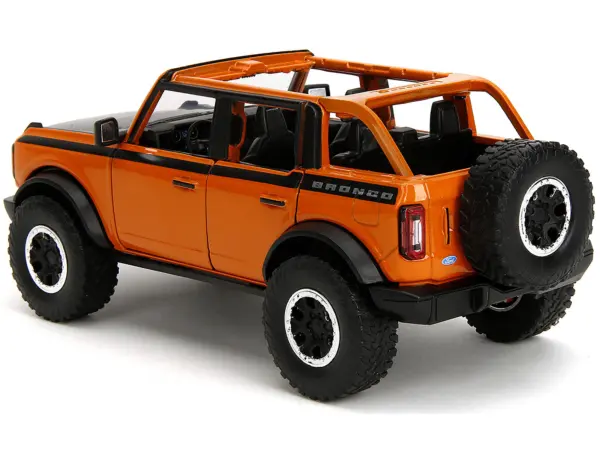 2021 Ford Bronco Open-Top Orange with Black Stripes and Hood with Extra Wheels "Just Trucks" Series 1/24 Diecast Model Car by Jada #5