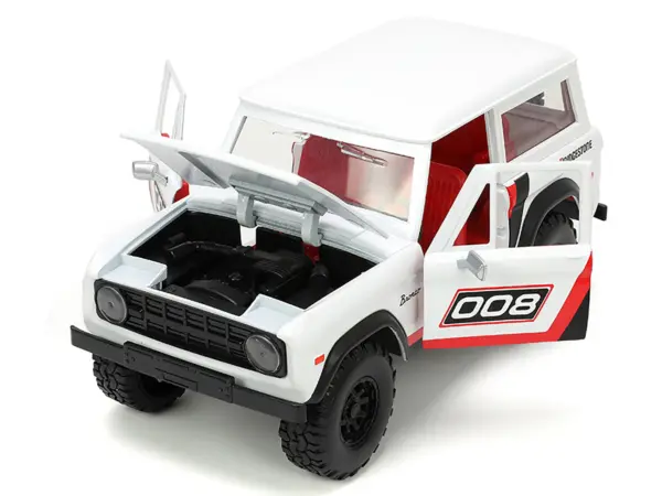 1973 Ford Bronco #008 White with Red and Black Stripes and Red Interior with Extra Wheels "Just Trucks" Series 1/24 Diecast Model Car by Jada #2