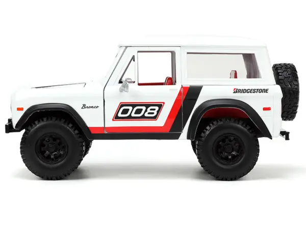 1973 Ford Bronco #008 White with Red and Black Stripes and Red Interior with Extra Wheels "Just Trucks" Series 1/24 Diecast Model Car by Jada #3