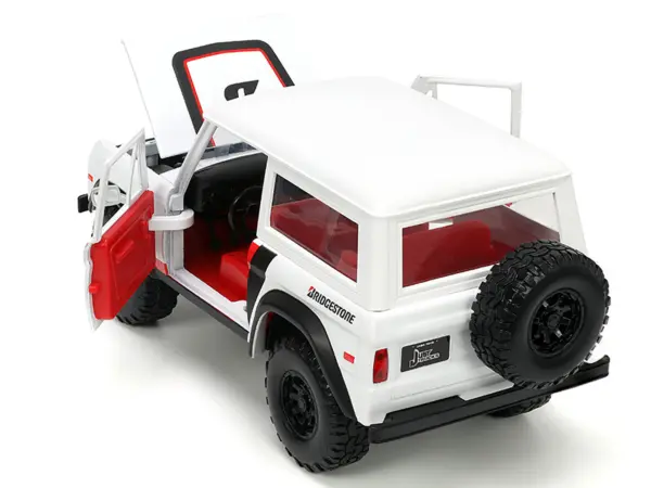 1973 Ford Bronco #008 White with Red and Black Stripes and Red Interior with Extra Wheels "Just Trucks" Series 1/24 Diecast Model Car by Jada #4