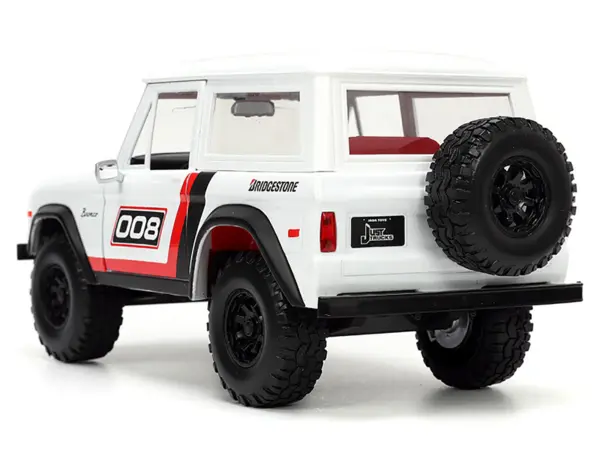 1973 Ford Bronco #008 White with Red and Black Stripes and Red Interior with Extra Wheels "Just Trucks" Series 1/24 Diecast Model Car by Jada #5