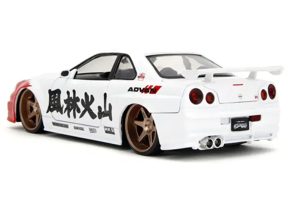 2002 Nissan Skyline GT-R (R34) RHD (Right Hand Drive) White with Red Graphics and Ryu Diecast Figure "Street Fighter" Video Game "Anime Hollywood Rides" Series 1/24 Diecast Model Car by Jada #5