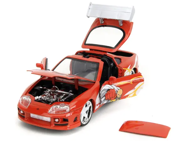1995 Toyota Supra Red with Graphics and Saitama Diecast Figure "One Punch Man" (2015-2019) TV Series 1/24 Diecast Model by Jada #2