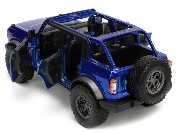 2021 Ford Bronco Open-Top Candy Blue Metallic with Extra Wheels "Just Trucks" Series 1/24 Diecast Model Car by Jada #4