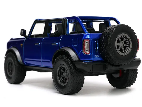 2021 Ford Bronco Open-Top Candy Blue Metallic with Extra Wheels "Just Trucks" Series 1/24 Diecast Model Car by Jada #5