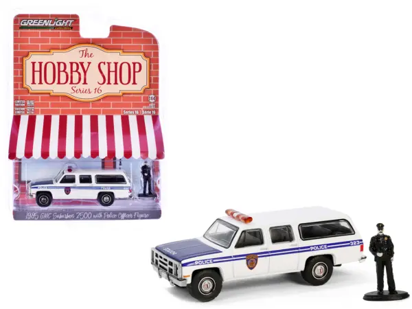 1985 GMC Suburban 2500 "New York City Transit Police Department" White with Blue Stripes and Police Officer Figure "The Hobby Shop" Series 16 1/64 Diecast Model Car by Greenlight #1