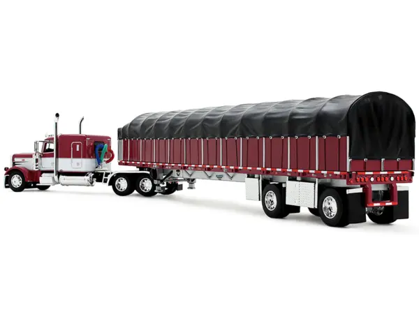 Peterbilt 389 with 63" Flat Top Sleeper and 53’ Wilson Roadbrute Flatbed Trailer with Covered Wagon Maroon with White Stripes 1/64 Diecast Model by DCP/First Gear #3
