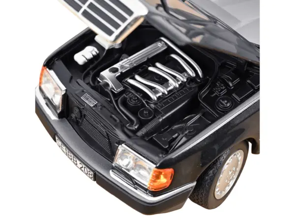 1990 Mercedes-Benz 300 DT-Model S124 Blue Black Metallic 1/18 Diecast Model Car by Norev #3