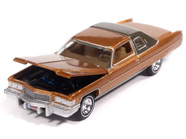 1976 Cadillac Coupe DeVille Amberlite Firemist Metallic "Luxury Cruisers" Series 1/64 Diecast Model Car by Auto World #3