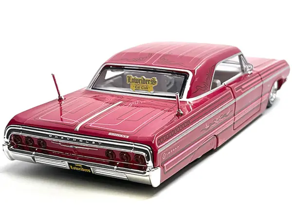 1964 Chevrolet Impala SS Lowrider Pink with Graphics and White Interior "Lowriders" "Maisto Design" Series 1/26 Diecast Model Car by Maisto #2
