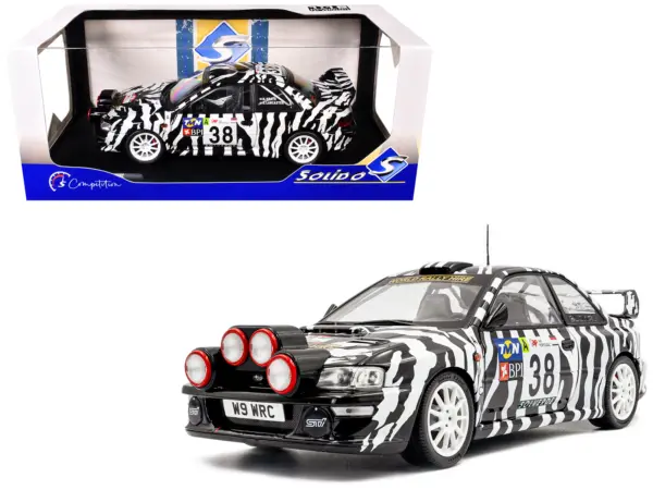 Subaru Impreza S5 WRC99 #38 Nigel Heath - Steve Lancaster "Rallye de Portugal" (2001) "Competition" Series 1/18 Diecast Model Car by Solido #1