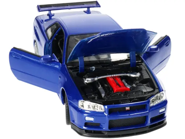 Nissan Skyline GT-R (R34) RHD (Right Hand Drive) Blue Metallic "NEX Models" 1/24 Diecast Model Car by Welly #2