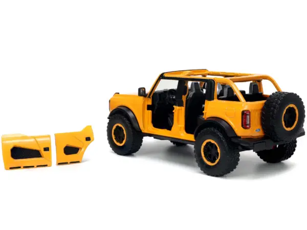 2021 Ford Bronco Orange Metallic with Extra Wheels "Just Trucks" Series 1/24 Diecast Model Car by Jada #3