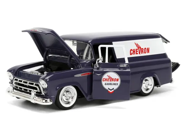 1957 Chevrolet Suburban "Chevron" Dark Blue with White Stripes and Chevron Gas Pump "Just Trucks" Series 1/24 Diecast Model Car by Jada #2