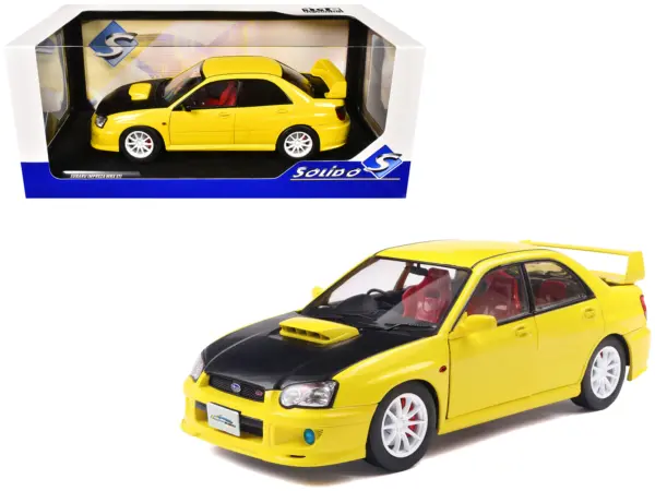 2003 Subaru Impreza WRX STI RHD (Right Hand Drive) Yellow with Carbon Hood 1/18 Diecast Model Car by Solido #1