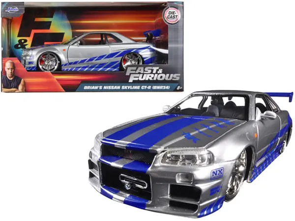 Brian's Nissan GTR Skyline R34 RHD (Right Hand Drive) Silver with Blue Stripes "Fast & Furious" Movie 1/24 Diecast Model Car by Jada #1