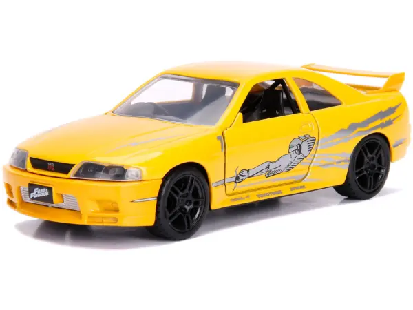 Leon's Nissan Skyline GT-R (BCNR33) Yellow Metallic with Graphics "Fast & Furious" Series 1/32 Diecast Model Car by Jada #3