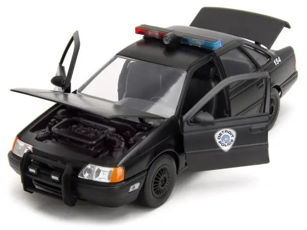 Ford Taurus OCP Matt Black "Detroit Police" and Robocop Diecast Figure 35th Anniversary "Robocop" (1987) Movie "Hollywood Rides" Series 1/24 Diecast Model Car by Jada #2