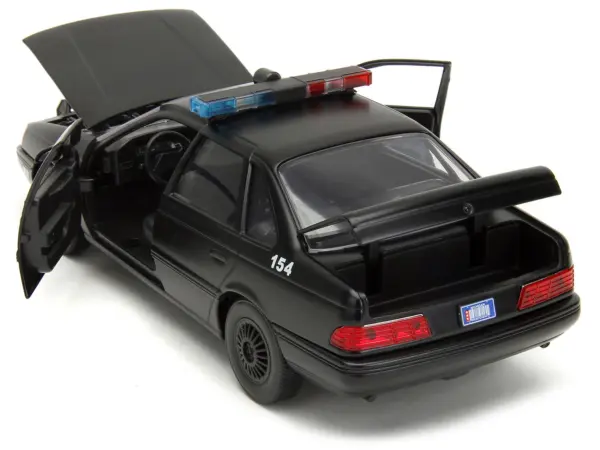 Ford Taurus OCP Matt Black "Detroit Police" and Robocop Diecast Figure 35th Anniversary "Robocop" (1987) Movie "Hollywood Rides" Series 1/24 Diecast Model Car by Jada #3