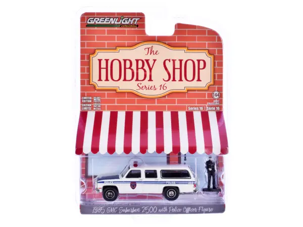 1985 GMC Suburban 2500 "New York City Transit Police Department" White with Blue Stripes and Police Officer Figure "The Hobby Shop" Series 16 1/64 Diecast Model Car by Greenlight #3