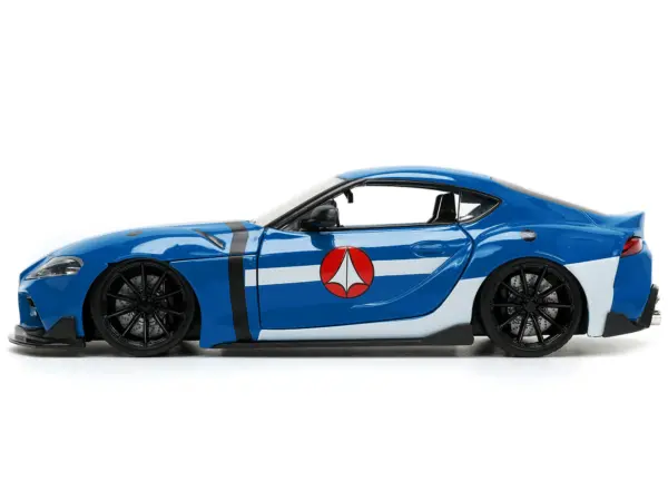 2020 Toyota Supra Blue with Graphics and Max Sterling Diecast Figurine "Robotech" "Hollywood Rides" Series 1/24 Diecast Model Car by Jada #3