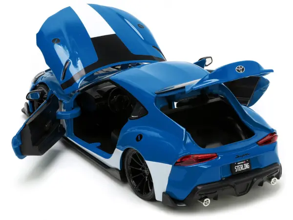 2020 Toyota Supra Blue with Graphics and Max Sterling Diecast Figurine "Robotech" "Hollywood Rides" Series 1/24 Diecast Model Car by Jada #4